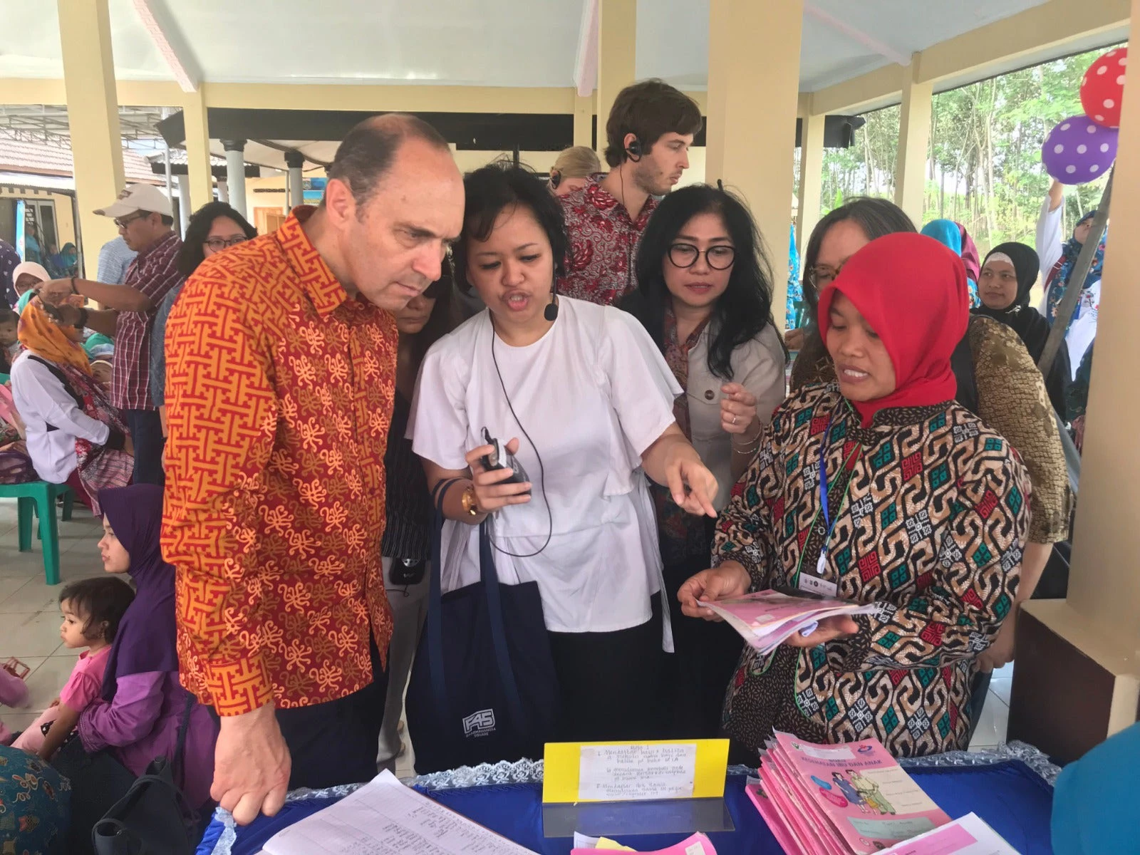 Human Development Workers like Ms. Asfiatul in Tangkilsari, East Java work tirelessly to converge delivery of services in education, health, nutrition and water and sanitation in Indonesia. 