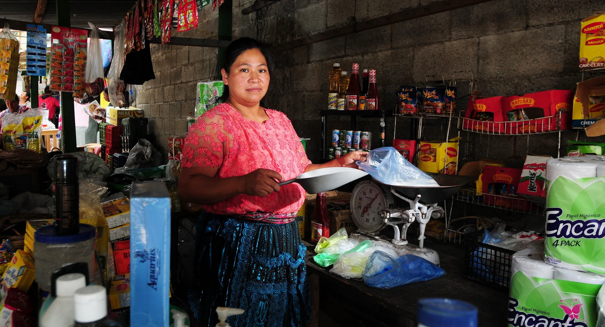 A woman in a market in Guatemala City, Guatemala. © Maria Fleischmann/World Bank