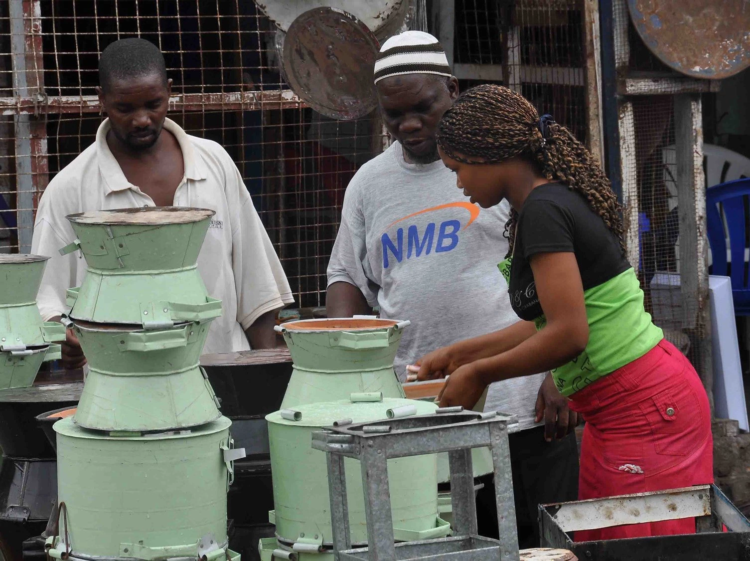 A woman buying a clean cookstove in Tanzania. Klas Sander / World Bank