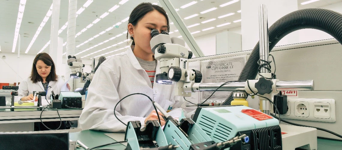 Workers at a machinery assembly plant in Kazakhstan making printed circuit boards. Astana