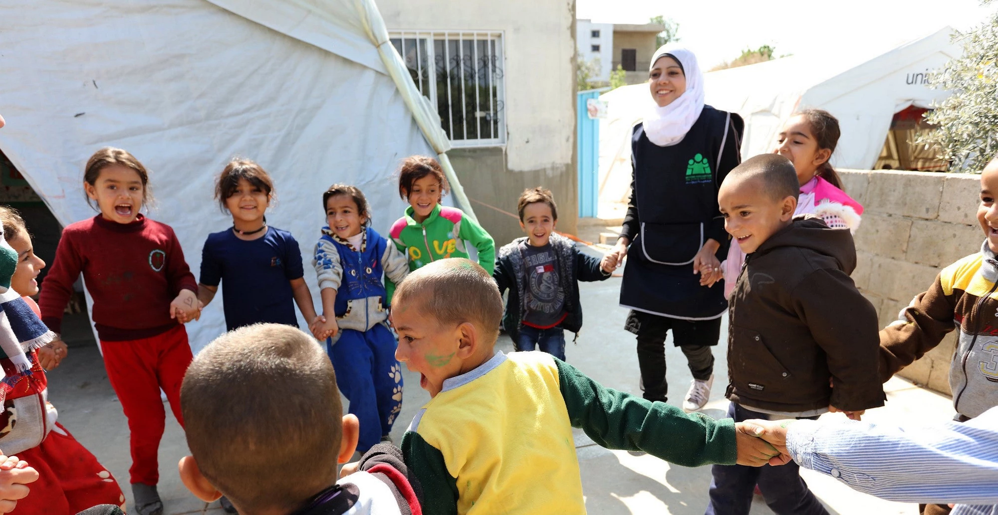 Photo of children in a refugee camp.