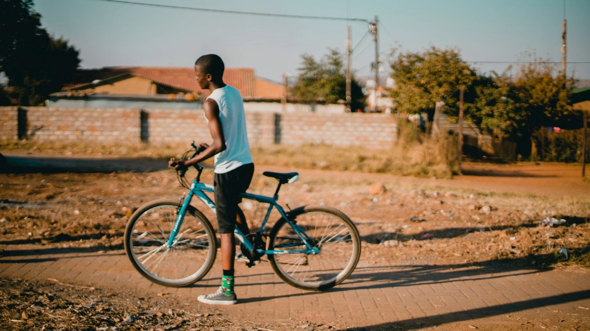 A young cyclist in South Africa. Photo: Rachel Martin/Unsplash