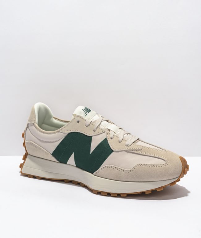 green and white new balance shoes